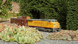 Small photo of a model, click to link to more small photos of the MTH Dash 8-40CW